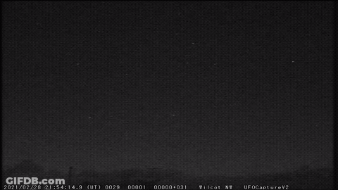 A Black And White Photo Of A Full Moon Taken On February 20Th GIF