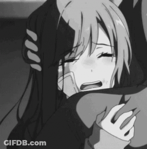 A Black And White Photo Of A Girl Crying While Hugging A Man . GIF