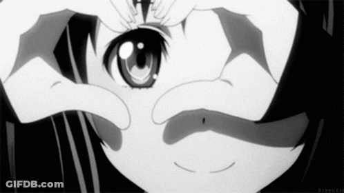 A Black And White Photo Of A Girl Looking Through Her Hands . GIF