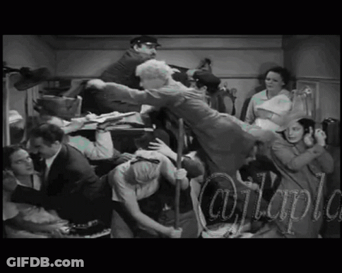 A Black And White Photo Of A Group Of People With A Caption That Says @Itaple GIF