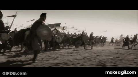 A Black And White Photo Of A Group Of Soldiers Fighting In A Field . GIF