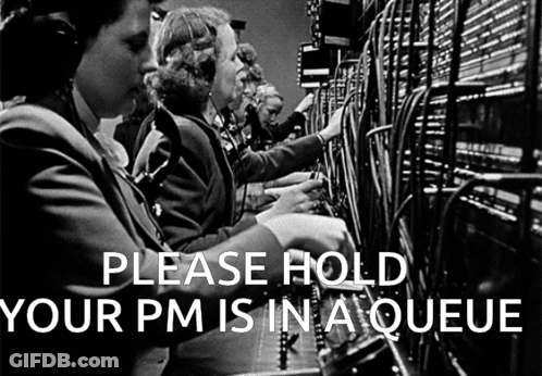 A Black And White Photo Of A Group Of Women Working On Telephones With The Words Please Hold Your Pm Is In A Queue GIF