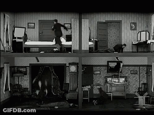A Black And White Photo Of A House With Many Rooms And People . GIF