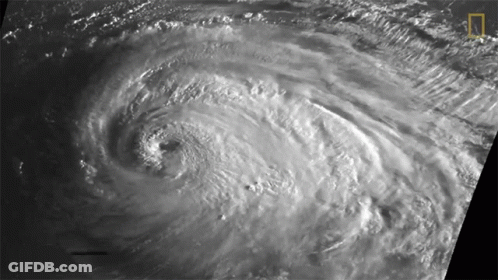 A Black And White Photo Of A Hurricane With The National Geographic Logo On The Bottom Right GIF