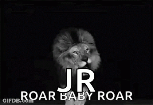 A Black And White Photo Of A Lion With The Words `` Jr Roar Baby Roar '' Written On It . GIF