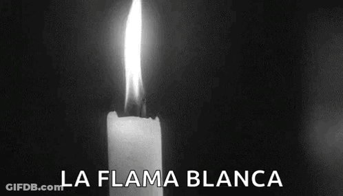 A Black And White Photo Of A Lit Candle With The Words La Flama Blanca Written On The Bottom GIF