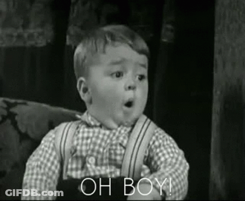 A Black And White Photo Of A Little Boy Making A Funny Face And Saying Oh Boy . GIF
