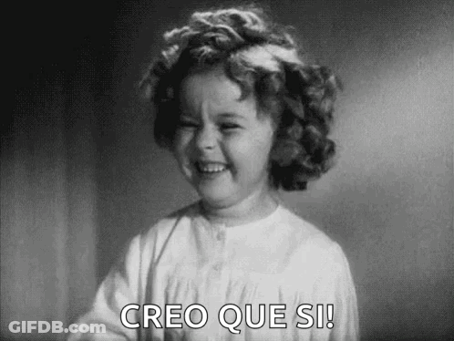 A Black And White Photo Of A Little Girl Laughing With The Words `` Creo Que Si '' Written Below Her . GIF