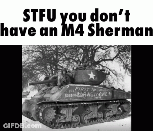 A Black And White Photo Of A M4 Sherman Tank GIF