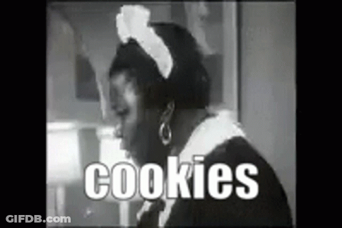 A Black And White Photo Of A Maid With The Words Cookies Written In White Letters GIF