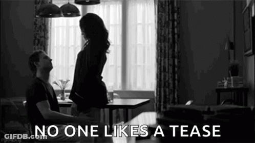 A Black And White Photo Of A Man And A Woman Having Sex In A Living Room . GIF