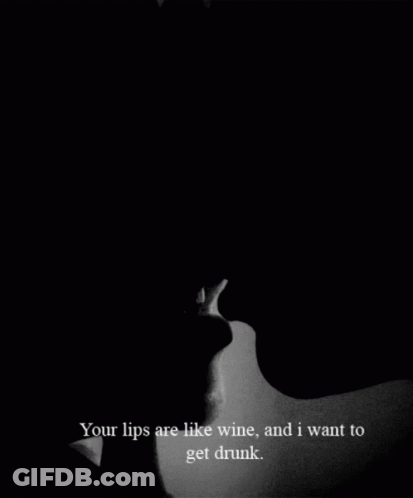 A Black And White Photo Of A Man And A Woman Kissing With The Caption Your Lips Are Like Wine And I Want To Get Drunk GIF