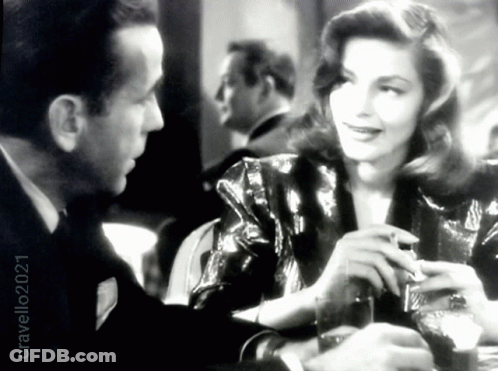 A Black And White Photo Of A Man And A Woman With A Caption That Says Cravell21 GIF
