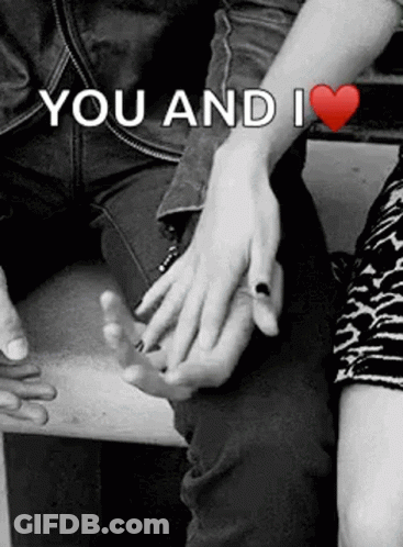 A Black And White Photo Of A Man And Woman Holding Hands With The Words `` You And I '' Written Above Them . GIF