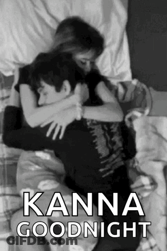 A Black And White Photo Of A Man And Woman Hugging With The Caption " Kanna Goodnight " . GIF