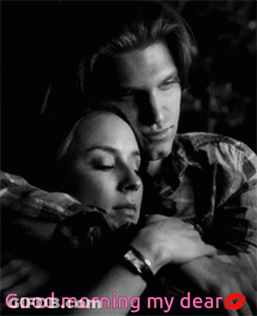 A Black And White Photo Of A Man And Woman Hugging With The Words " Good Morning My Dear " GIF