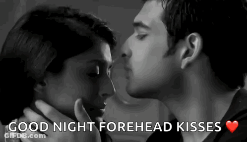 A Black And White Photo Of A Man And Woman Kissing With The Words Good Night Forehead Kisses . GIF
