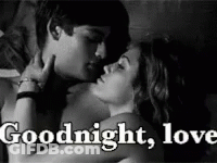 A Black And White Photo Of A Man And Woman Kissing With The Words `` Goodnight , Love '' . GIF