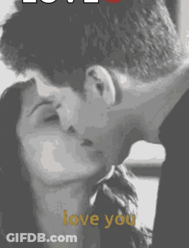 A Black And White Photo Of A Man And Woman Kissing With The Words " Love You " Written On The Bottom GIF