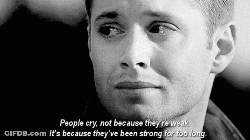 A Black And White Photo Of A Man Crying With A Quote On It . GIF