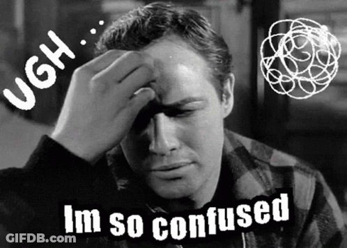 A Black And White Photo Of A Man Holding His Head With The Words Im So Confused Below Him GIF
