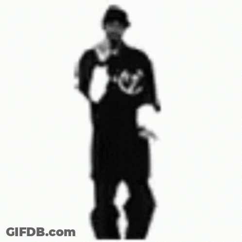 A Black And White Photo Of A Man In A Black Shirt And Hat Standing On A White Background . GIF