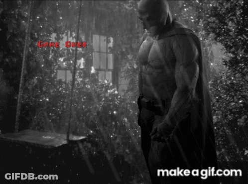 A Black And White Photo Of A Man In A Cape With The Words " Game Over " On The Bottom GIF