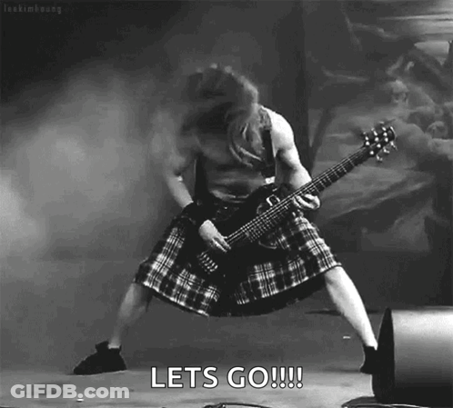A Black And White Photo Of A Man In A Kilt Playing A Guitar With The Words Let 'S Go !!! Below Him GIF