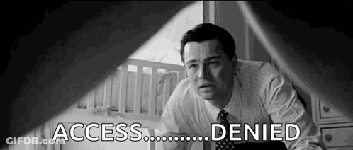 A Black And White Photo Of A Man In A Suit And Tie Looking At A Baby Crib . GIF