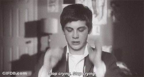 A Black And White Photo Of A Man In A Suit And Tie Saying `` Stop Crying , Stop Crying . '' GIF