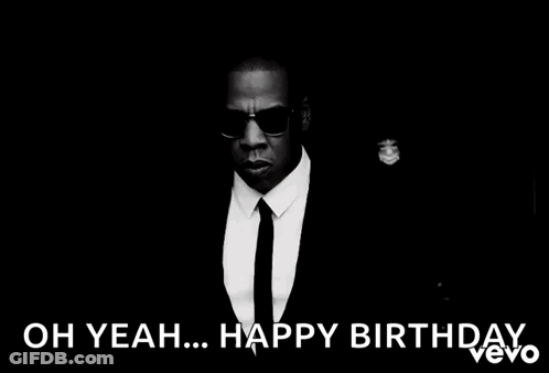 A Black And White Photo Of A Man In A Suit And Tie With The Caption " Oh Yeah ... Happy Birthday " GIF