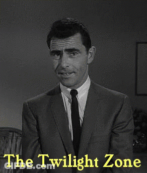A Black And White Photo Of A Man In A Suit And Tie With The Twilight Zone Written On The Bottom GIF