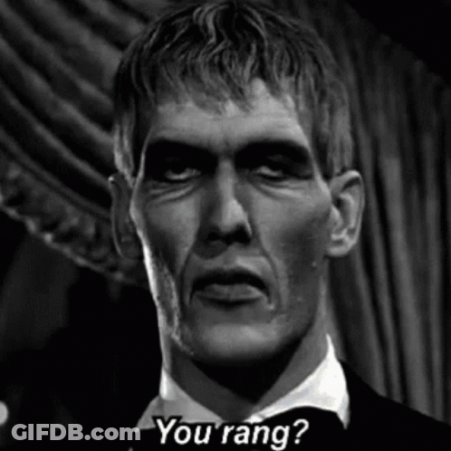 A Black And White Photo Of A Man In A Tuxedo Asking , `` You Rang ? '' GIF