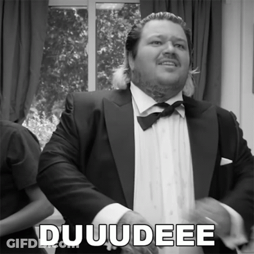 A Black And White Photo Of A Man In A Tuxedo With The Word Duuudee On The Bottom GIF