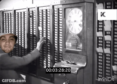 A Black And White Photo Of A Man In Front Of A Clock That Says 00 03 28 20 GIF