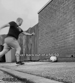 A Black And White Photo Of A Man Kicking A Soccer Ball With The Words Never Back Out Of A 50/50 Below Him GIF