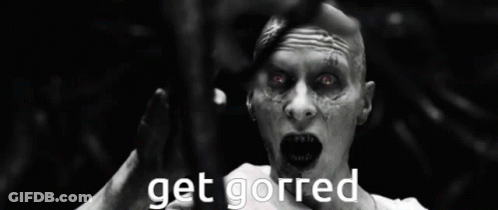 A Black And White Photo Of A Man Laying In The Water With The Words Get Gorred Above Him GIF