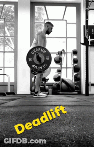 A Black And White Photo Of A Man Lifting A Barbell With The Word Deadlift On The Floor GIF