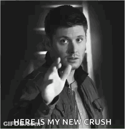 A Black And White Photo Of A Man Making A Funny Face And Saying `` Here Is My New Crush '' . GIF