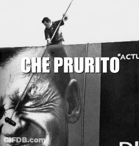 A Black And White Photo Of A Man On Top Of A Billboard With The Words Che Prurito GIF