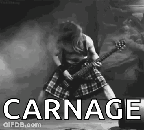 A Black And White Photo Of A Man Playing A Guitar With The Word Carnage Written Below Him GIF