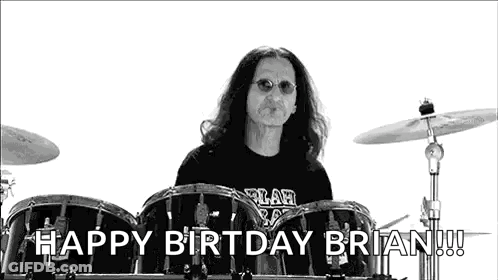 A Black And White Photo Of A Man Playing Drums With The Words `` Happy Birthday Brian ! '' GIF