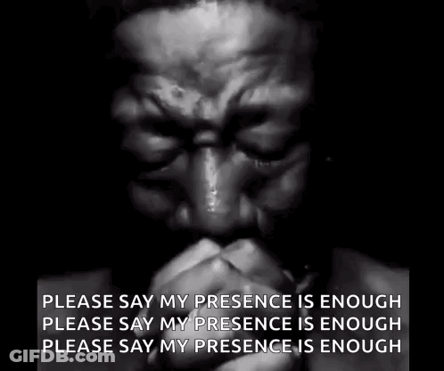 A Black And White Photo Of A Man Praying With His Hands Folded And A Quote . GIF