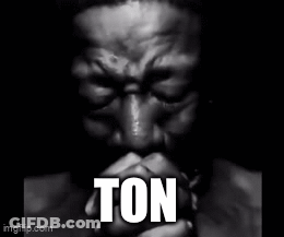 A Black And White Photo Of A Man Praying With The Word Ton Written In White Letters GIF