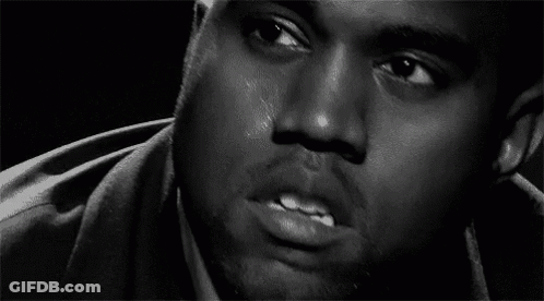 A Black And White Photo Of A Man 'S Face With Tears Coming Down His Face . GIF