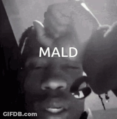 A Black And White Photo Of A Man 'S Face With The Word Mald On It . GIF