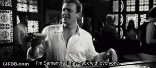 A Black And White Photo Of A Man Saying " I 'M Samantha I Have Sex With Everyone " GIF