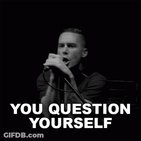 A Black And White Photo Of A Man Singing Into A Microphone With The Words You Question Yourself Below Him GIF
