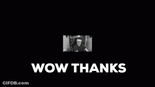 A Black And White Photo Of A Man Sitting In Front Of A Computer And The Words Wow Thanks . GIF