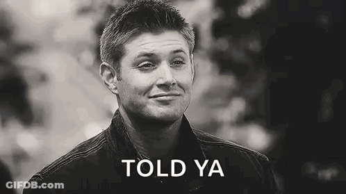 A Black And White Photo Of A Man Smiling With The Words `` Told Ya '' Written On The Bottom . GIF